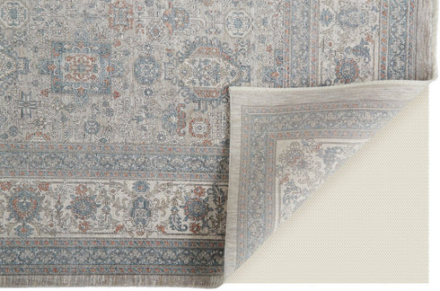 7' X 10' Silver Taupe and Blue Oriental Power Loom Worn Faded Area Rug With Fringe